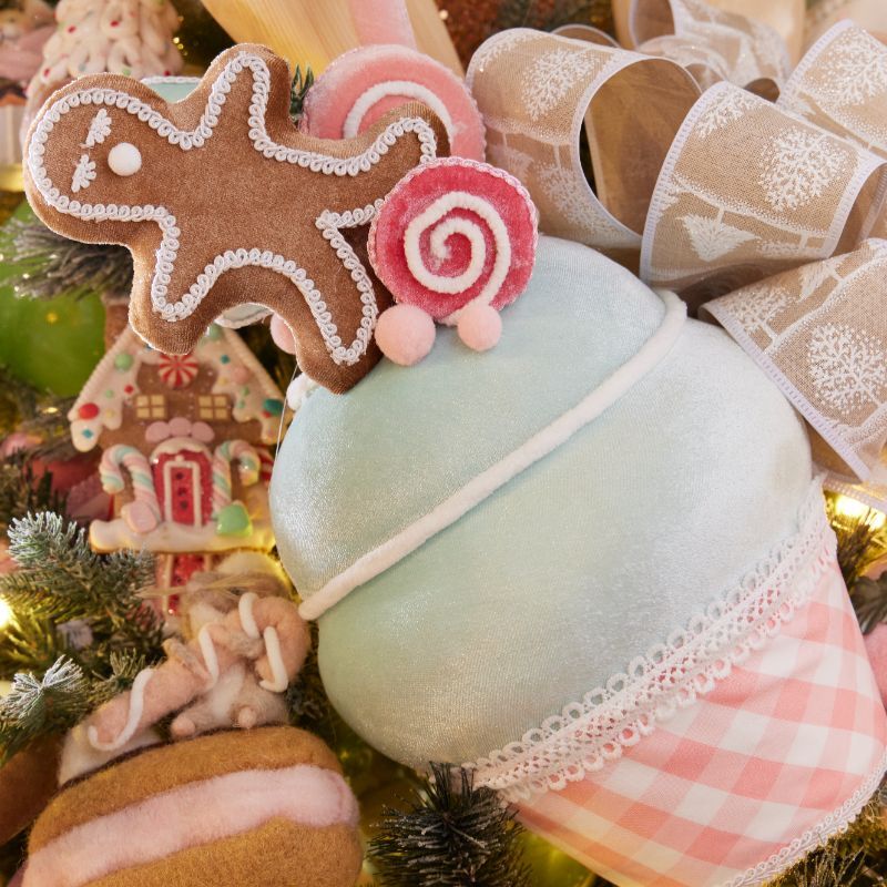 Mint cupcake with gingerbread and swirl candy
