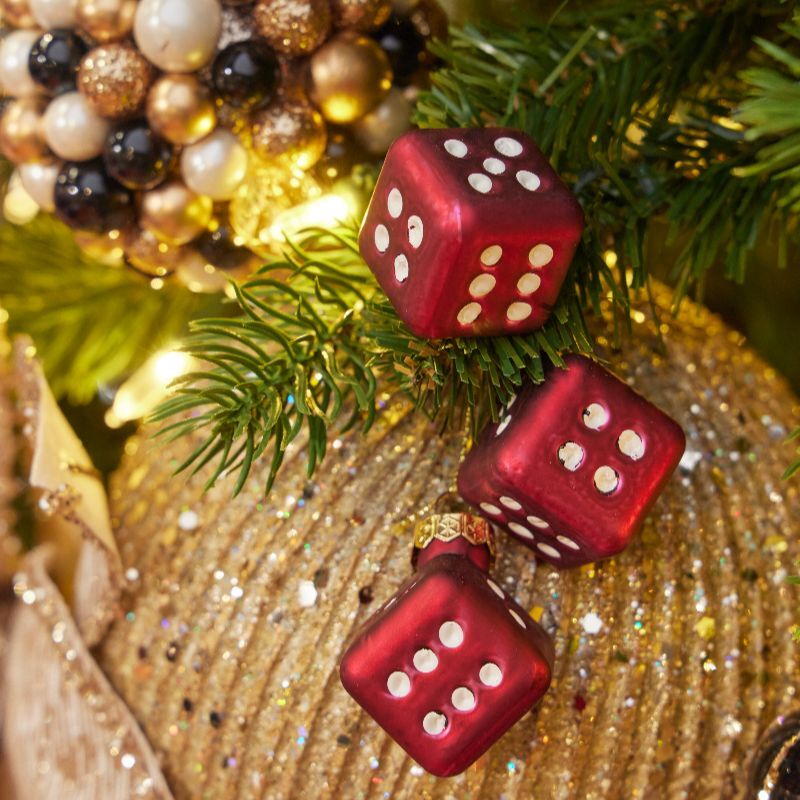 Ruby dice ornaments over glittered gold bauble