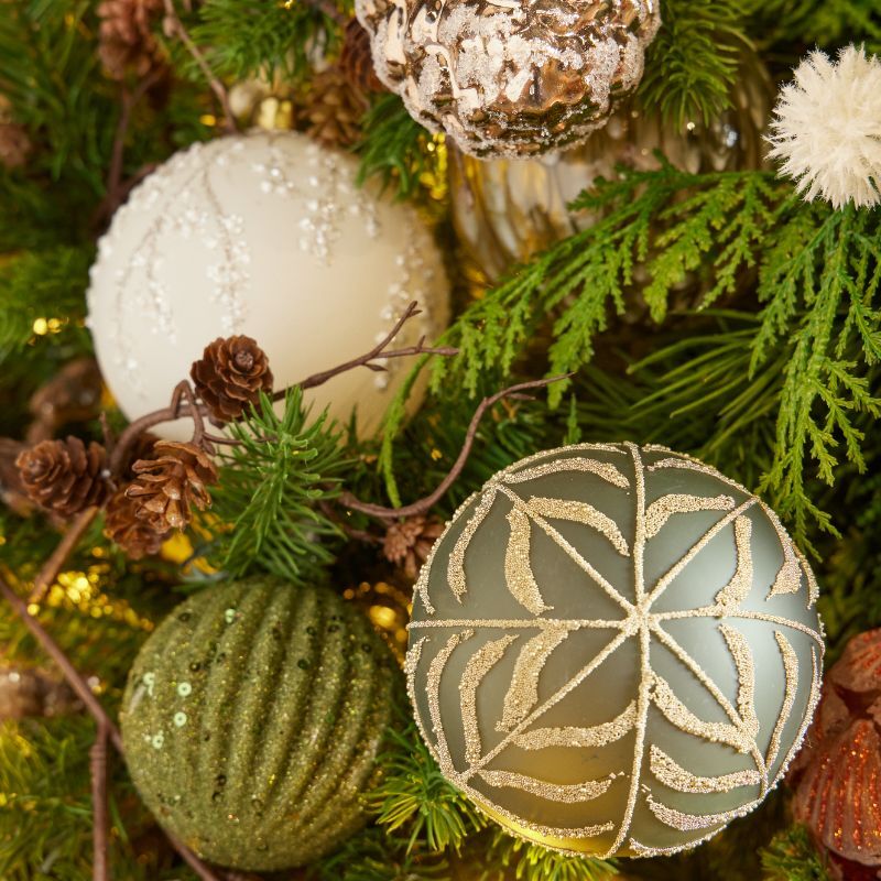 Green and cream baubles with natural textures