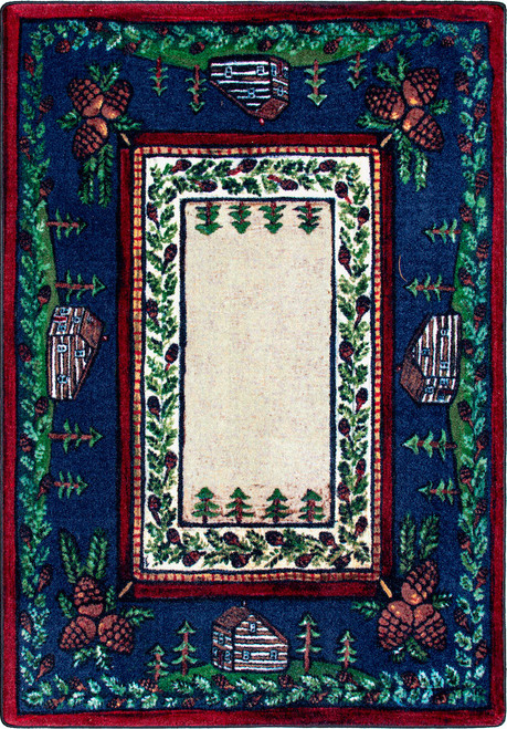 American Dakota Cabin in the Pines Clearing rug with cabins and pinecones in a deep blue border around a pale evergreen-framed center