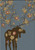 American Dakota Moose Blossom Blue rug with a dark moose and flowering branch-like antlers on muted blue