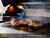 TrueFlame Cooking Grates and Optional Smoker Box In Use