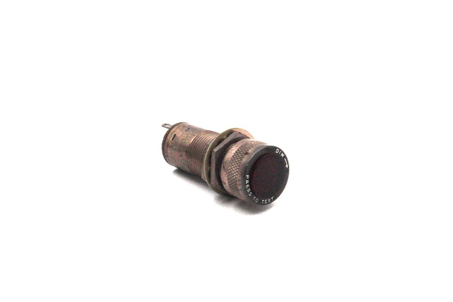 This AN3157-6 - Lamp & Switch Assy. - Red is in NS condition