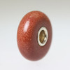 Goldstone Bead With A Twist