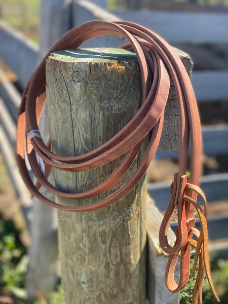 Split reins, 8' long, Hermann Oak harness leather, excellent quality, top of the line, heavy duty.  Widths available are 1/2", 5/8", and 3/4".