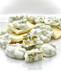White Chocolate Pistachio Clusters. Nom Nom. Chocolates are shipped Mon-Wed only during the hot months, and a $3 cold pack charge is added to the price.