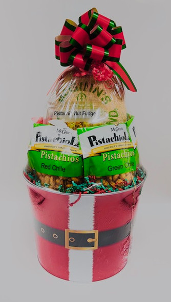 A metal painted tub of Santa's suit and belt. Filled with delicious flavored pistachio and pistachio candies.