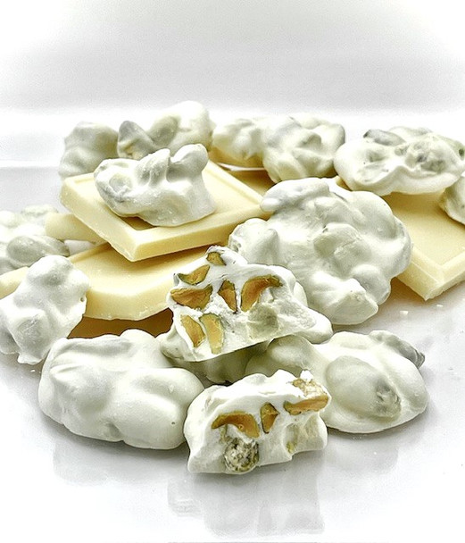 White Chocolate Pistachio Clusters. Nom Nom. Chocolates are shipped Mon-Wed only during the hot months, and a $3 cold pack charge is added to the price.