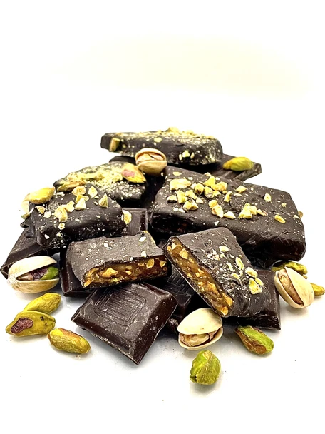 Delicious pistachio butter toffee covered with dark chocolate, salt and more pistachios!