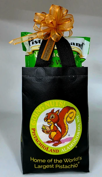 The top pick bag includes a reuseable bag filled with 8 oz. poly bag of The Works Pistachios (Green chile, Red chile, Garlic, Lemon-Lime & Roasted Salted in shell pistachios) and a 5oz. bag of Cinnamon Pistachio Bites.