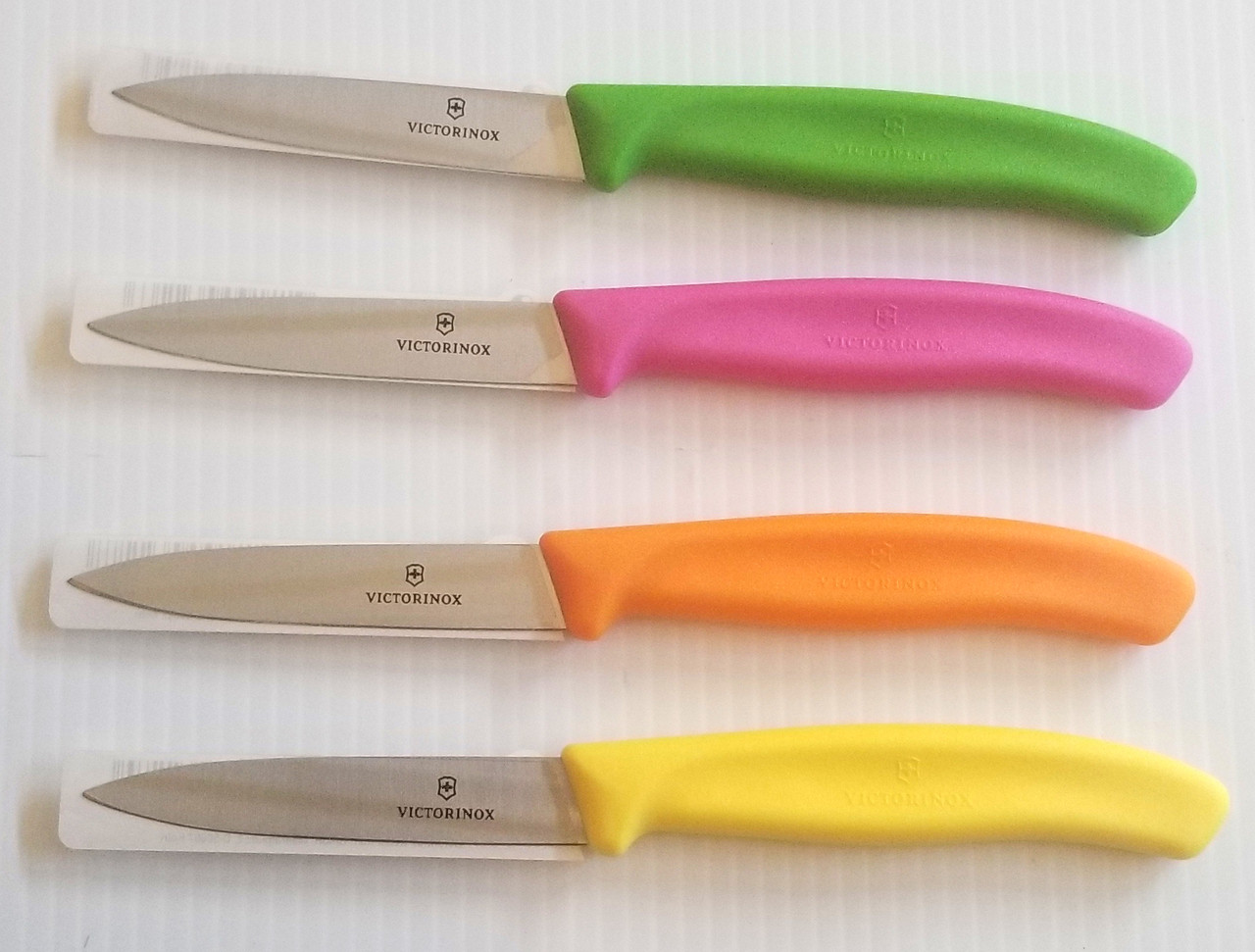 https://cdn11.bigcommerce.com/s-c3dtlhs339/images/stencil/1280x1280/products/330/1352/Victorinox_colored_paring_knives__90781.1542665620.jpg?c=2?imbypass=on