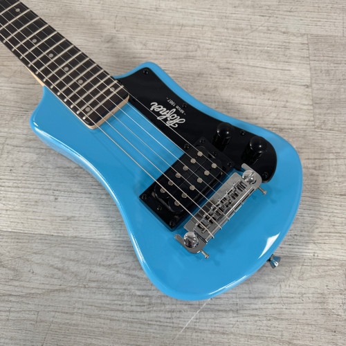 Vist Large View of Product Image Which is Used Hofner HTC-SH Shorty Travel Electric Guitar - Blue - Gig Bag Included