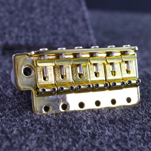 Vist Large View of Product Image Which is Used Fender STRAT BRIDGE GOLD IMPORT SPACING Guitar Hardware
