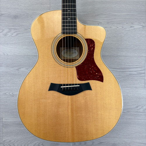 Vist Large View of Product Image Which is Used Taylor 214CE DLX W/OHSC Solid Top Acoustic Guitar Natural