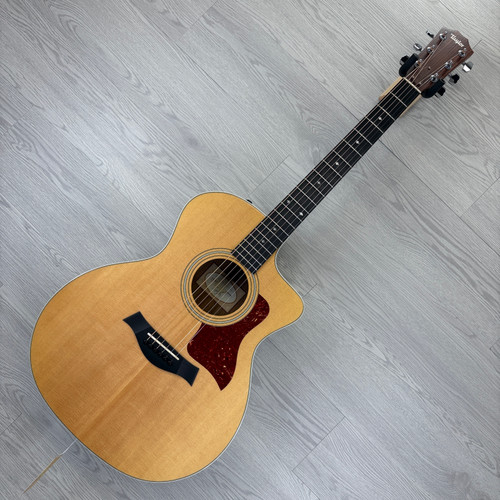 Vist Large View of Product Image Which is Used Taylor 214ce DLX Solid-Top Acoustic/Electric w/OHSC