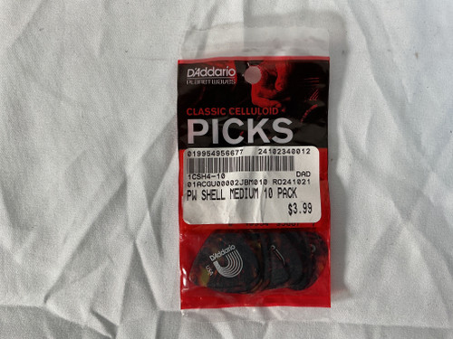 Vist Large View of Product Image Which is New PW SHELL MEDIUM 10 PACK medium gauge guitar picks .70mm-.0.28"
