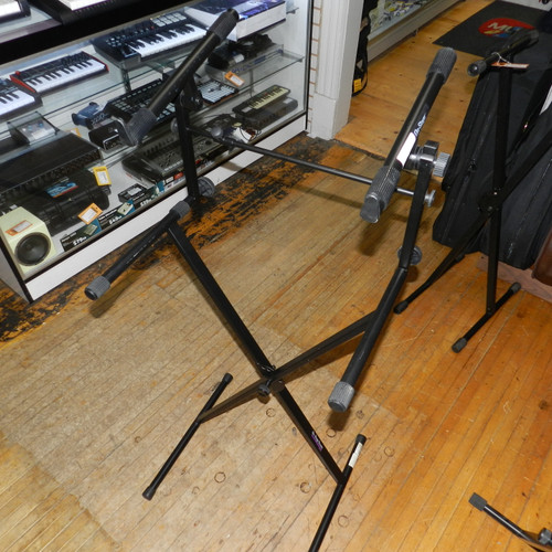Vist Large View of Product Image Which is Used On Stage SINGLE BRACED DOUBLE KEYBOARD STAND Tiered Keyboard Stand
