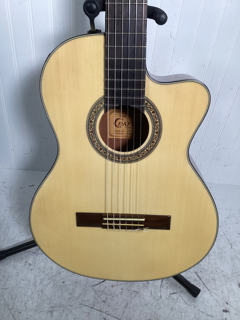 Vist Large View of Product Image Which is Used Crafter HCC-24EQ/NT Laminate Top Acoustic Guitar Natural 6-String