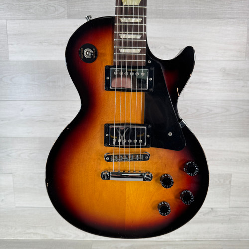 Vist Large View of Product Image Which is Used Gibson Les Paul Studio Electric Guitar - Tobacco Sunburst - Gig Bag Included