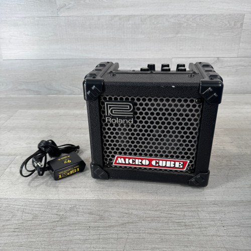 Vist Large View of Product Image Which is Used Roland Micro Cube - 1 x 5-inch 2-watt Guitar Combo Amplifier