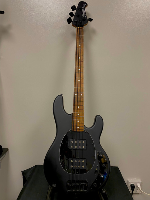 Vist Large View of Product Image Which is Used Sterling by Ernie Ball STINGRAY 4 HH Modern Metal Bass Guitar Black 4-String