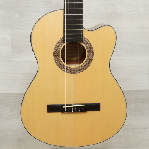 Vist Large View of Product Image Which is Used Lucero LC-100CE Laminate Top Acoustic Guitar Natural