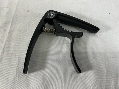 Vist Large View of Product Image Which is Used NORDIC ESSENTIALS CAPO Guitar Accessory