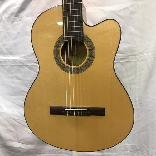 Vist Large View of Product Image Which is Used Lucero LC-100CE Laminate Top Acoustic Guitar Natural