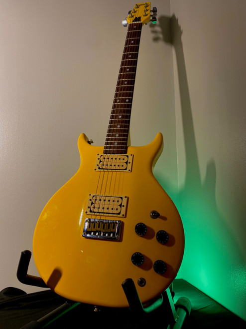 Vist Large View of Product Image Which is Used Washburn RAVEN Vintage Double Cutaway Electric Guitar Yellow 6-String