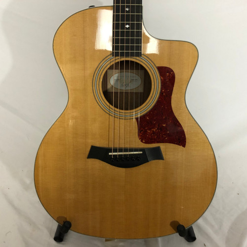 Vist Large View of Product Image Which is Used Taylor 214CE DLX Solid Top Acoustic Guitar Natural