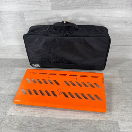 Vist Large View of Product Image Which is Used Gator Large Pedalboard with Bag - Orange - 23.75 x 10.6-inch