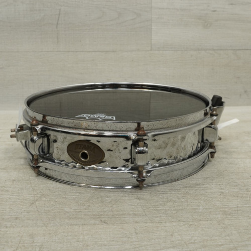 Vist Large View of Product Image Which is Used Tama 12x3 Hammered Steel Piccolo Snare Drum