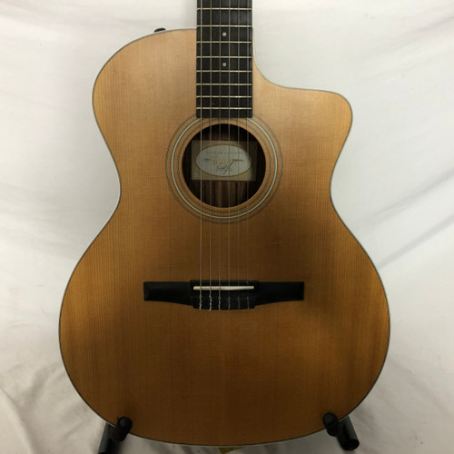 Vist Large View of Product Image Which is Used Taylor 214CE-N Solid Top Acoustic Guitar Natural