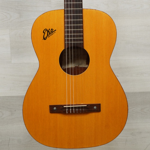 Vist Large View of Product Image Which is Used Eko Fiesta 496 Laminate Top Acoustic Guitar Natural