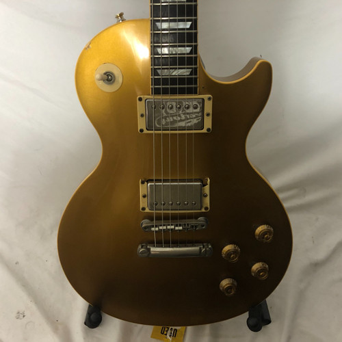 Vist Large View of Product Image Which is gibson les paul classic goldtop