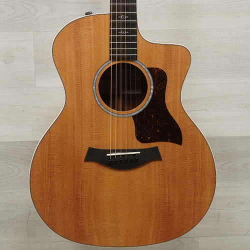 Vist Large View of Product Image Which is Used Taylor 214ce Koa Deluxe Solid Top Acoustic Guitar Natural