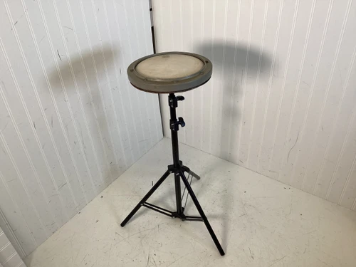Vist Large View of Product Image Which is Used Remo PRACTICE PAD W/STAND Percussion Instrument