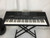 Used Yamaha PSR-E463 PLUS POWER PLUS BAG 61-Key Keyboard 61-Key 40012-S000295766 View 1