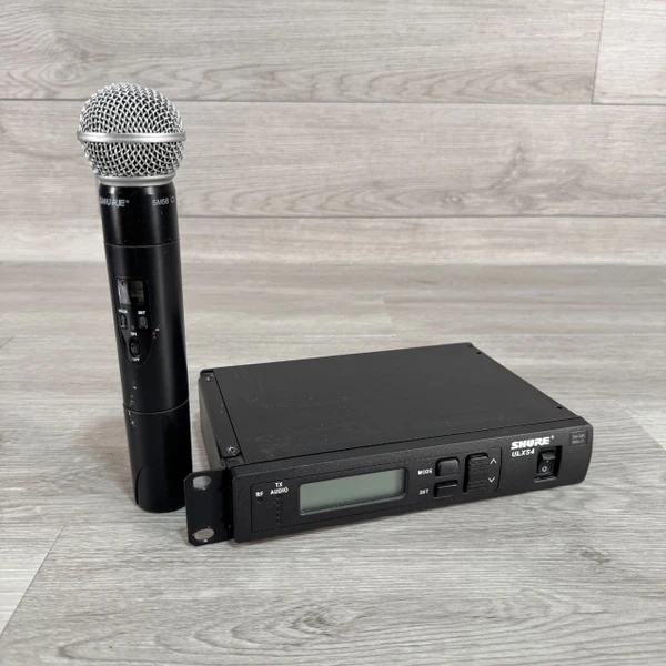 Used Shure SLX4 W/SLX2 WIRELESS HANDHELD Microphone