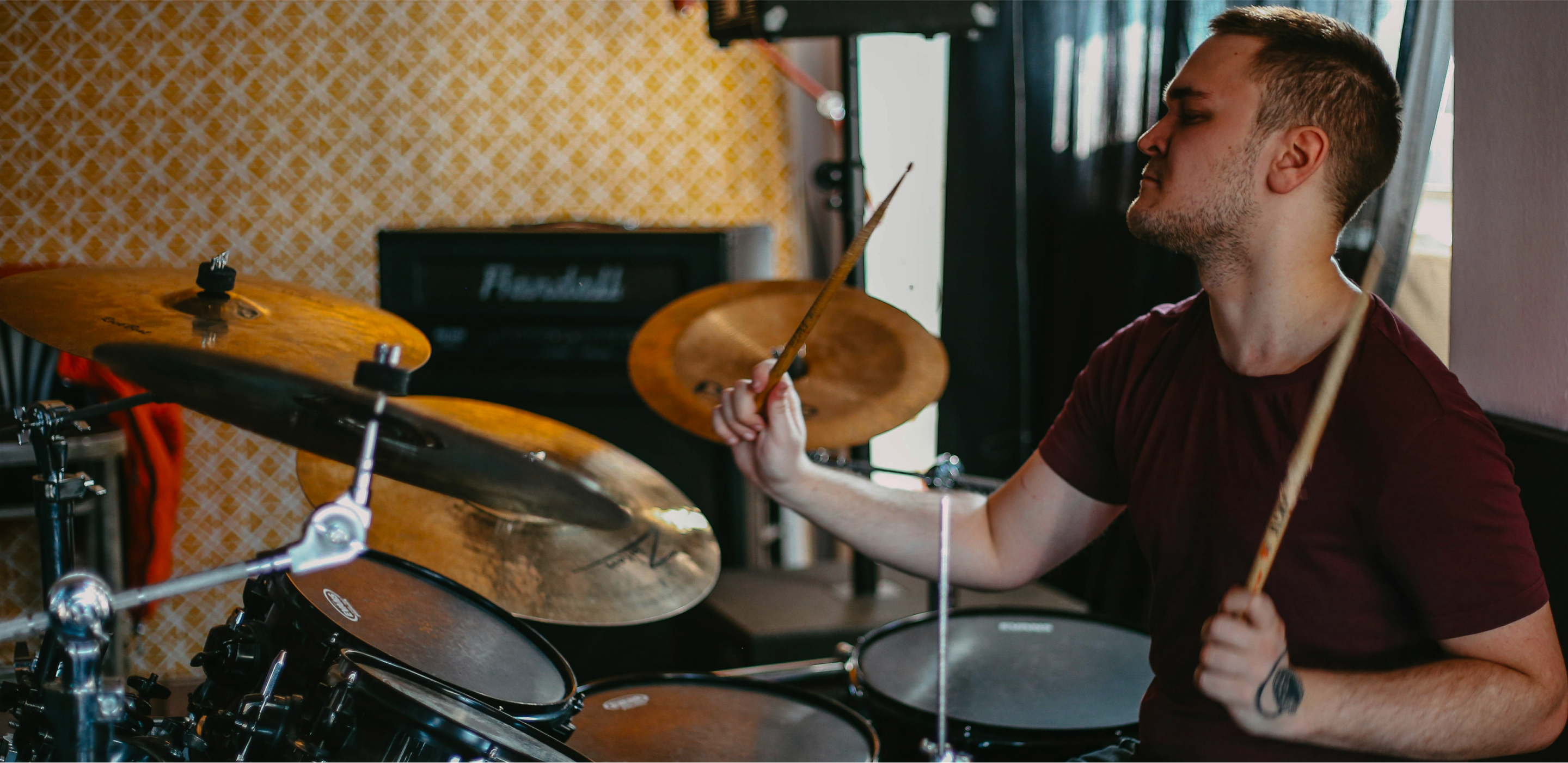 Man playing on the drum set