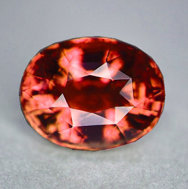 7x5.5 mm { 1.48 cts} Oval Cut Extreme Brilliancy Natural Color Shift Pink Orange Malaya Garnet {Flawless-VVS}--AAA Grade