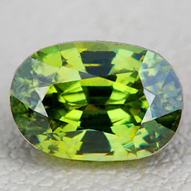 5.5x4 mm { 0.62 cts } Oval AAA Rainbow Sparkle Natural Yellow Green Demantoid Garnet {Flawless-VVS}