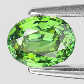 6x4.5 mm { 0.71 cts } Oval AAA Luster Rainbow Sparkle AAA Green Demantoid Natural ( VVS )--Horsetail Inclusion