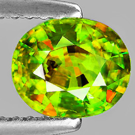 7x6 mm { 1.29 cts } Oval Excellent Rainbow Flash Intense Green Sphene Natural { VVS }--AAA Grade