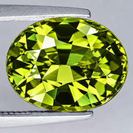 6.5x5.5 mm ( 0.87 cts ) Oval AAA Fire Intense Yellow Green Chrysoberyl Natural {Flawless-VVS}--AAA Grade