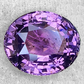 7.5x6.5 mm { 1.58 cts } Oval AAA Fire Natural AAA Purple Spinel