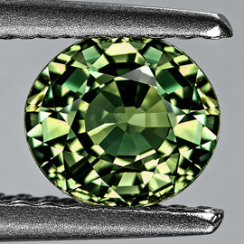6x5.5 mm{ 0.95 cts } Oval AAA Fire Natural Golden Green Sapphire {Flawless-VVS}