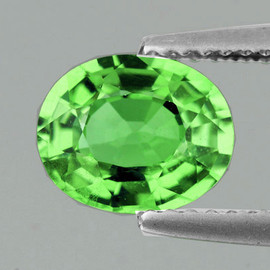 6.5x5.5mm {0.94 cts} Oval AAA Fire Natural Vivid Green Tsavorite Garnet (VVS-VS)