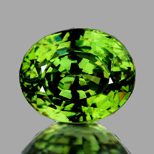 0.87 cts Oval 5.5x4.5 mm AAA Rainbow Sparkle Natural Green Demantoid (Flawless-VVS)--AAA Grade