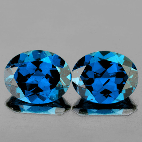 9x7 mm 2 pcs Oval AAA Fire Natural London Blue Topaz {Flawless-VVS1}